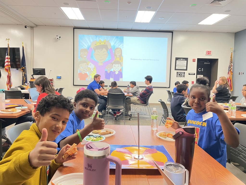 Three students at the Math 24 competition eating their lunch. 