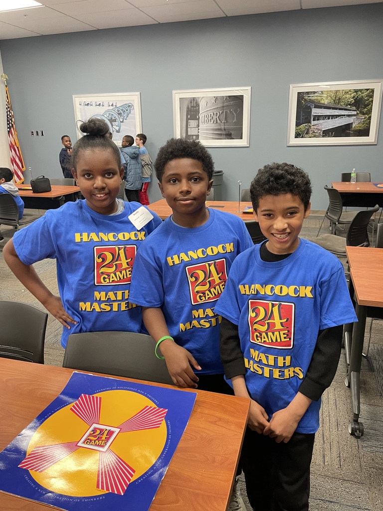 Three students at the Math 24 competition. 