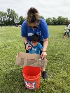 A student plays Ping Pong Pinball at Field Day.