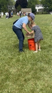 A student plays Ping Pong Pinball at Field Day.