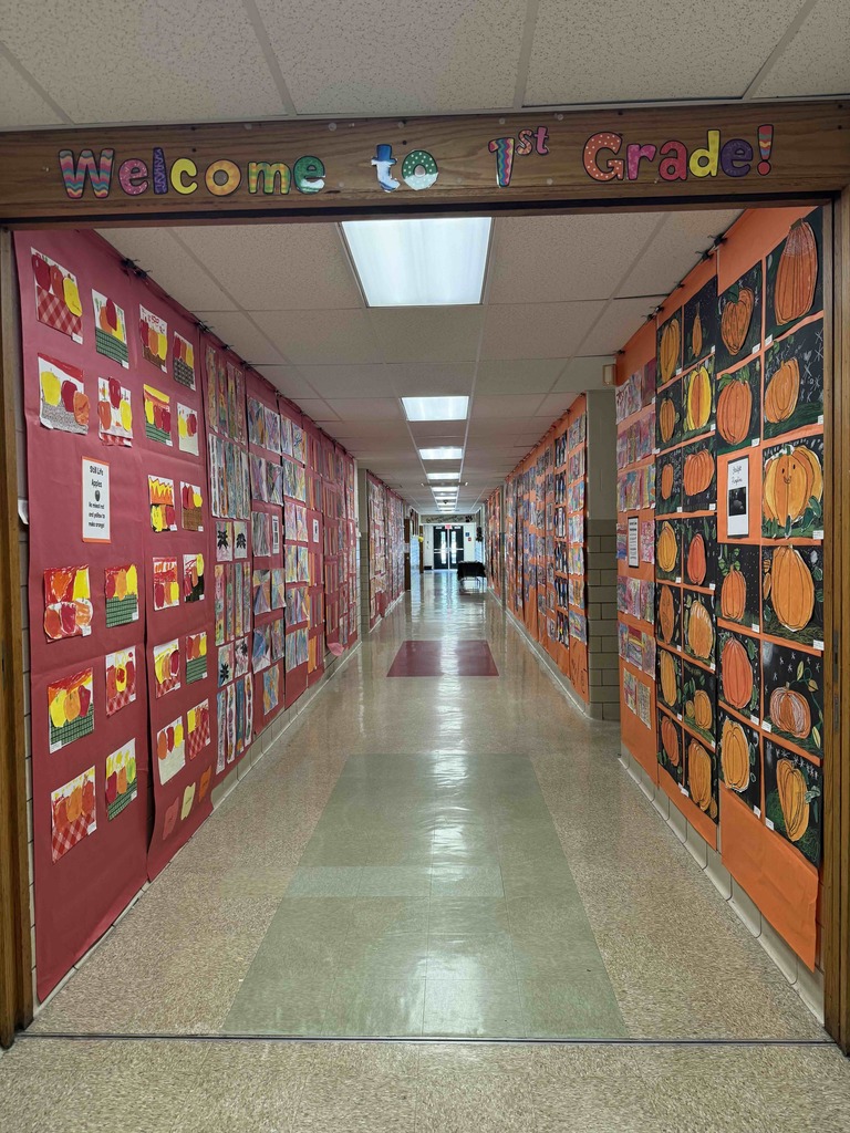 Student artwork displayed in the hallway for Marshall Street's annual Art Show.