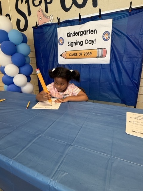 Kindergarten signing day for Class of 2039.