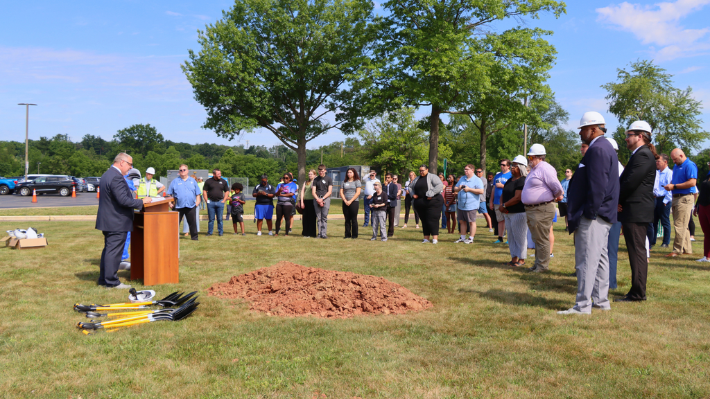 Community members, staff, families, students, township and municipal officials, architect and construction company representatives, and state and local elected official representatives gather for the Norristown Area High School Renovation and Expansion Project Groundbreaking Ceremony on June 25, 2026.