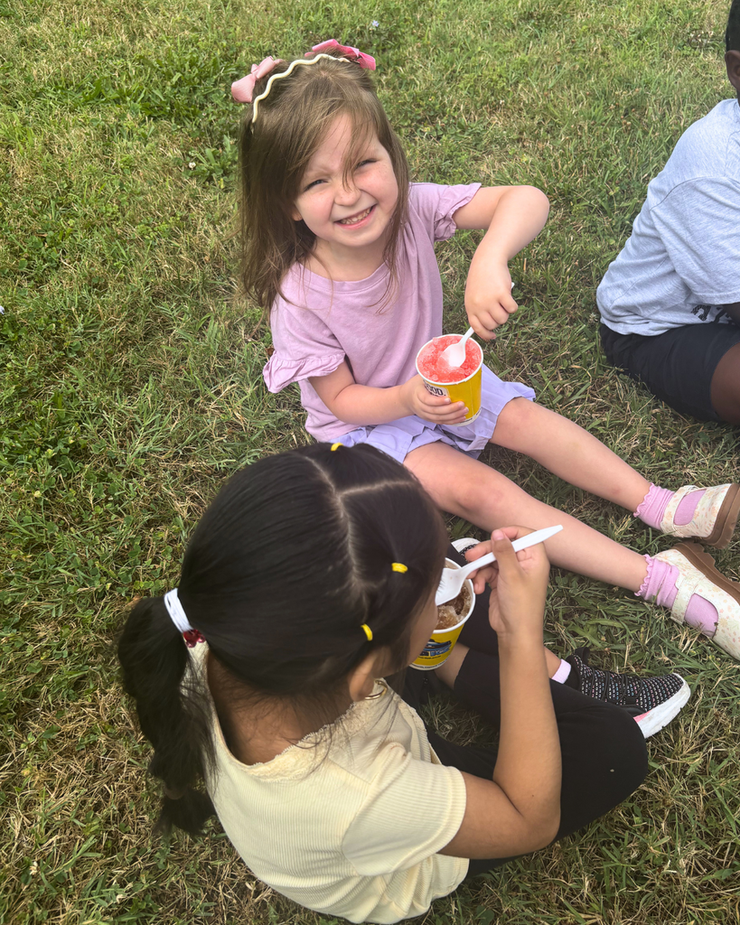 Students enjoying water ice on the last day of the summer program.