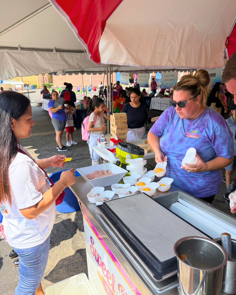 Sweet Briar cart staff scooping ice cream.