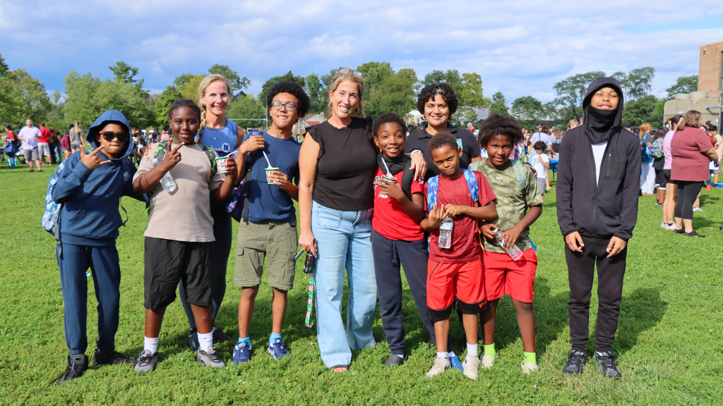 ESTLA Students and staff pose for large group photo at their family welcome event.