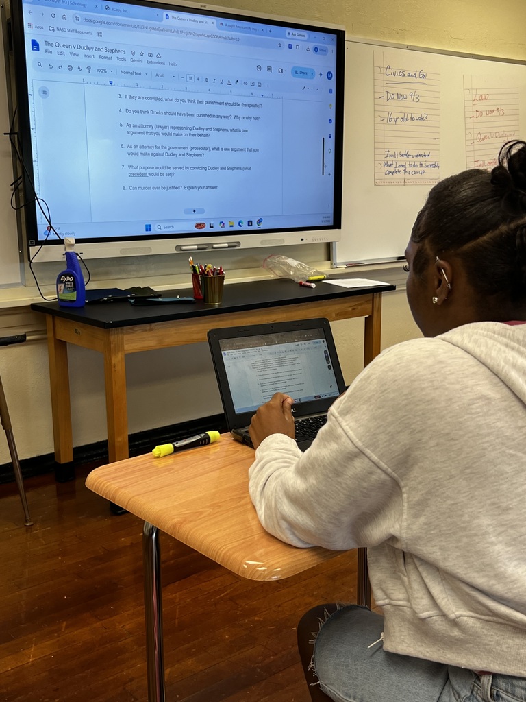 A student is working on her chromebook