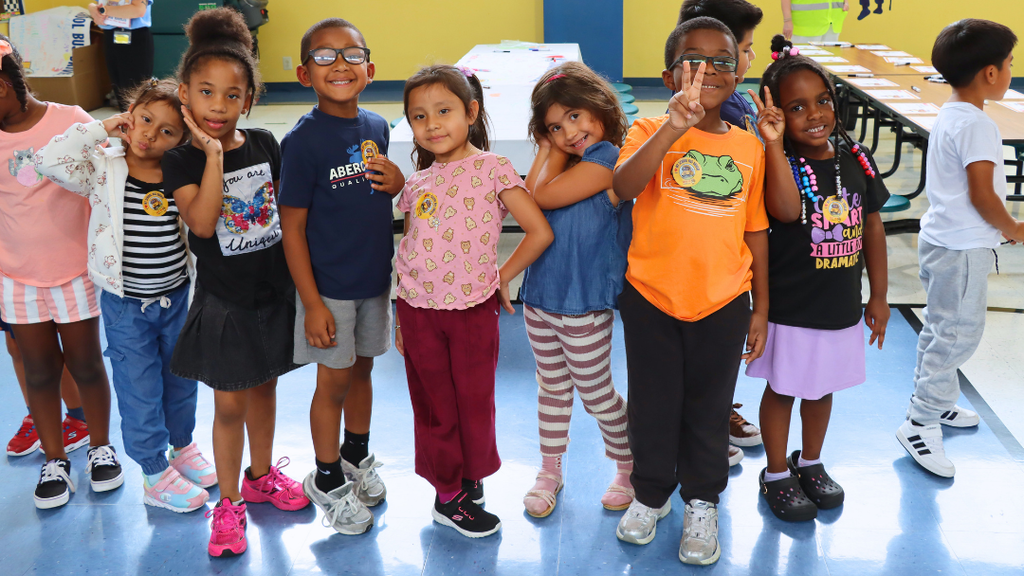 Group of students pose for photo.
