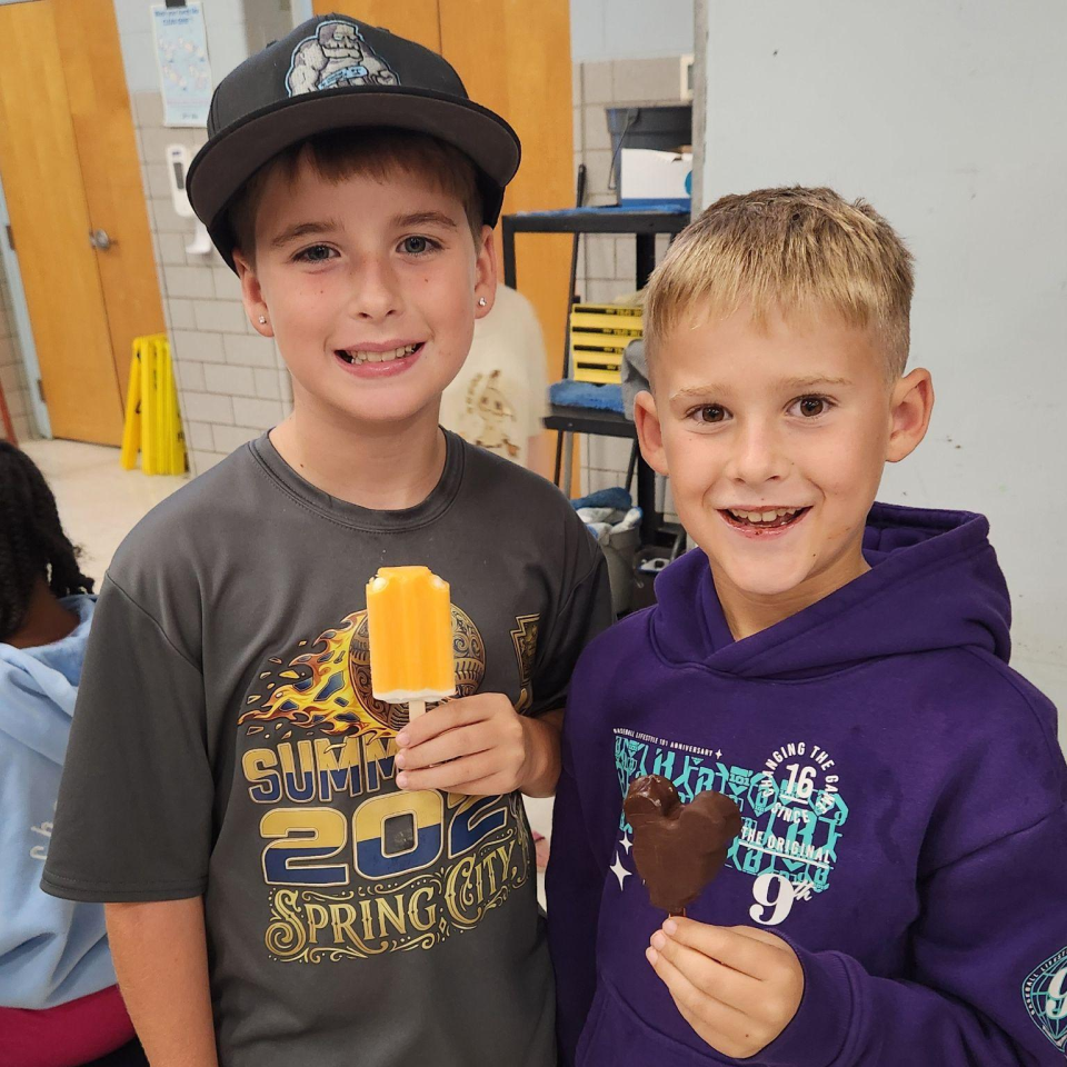 Students enjoying frozen treats and popcorn during Marshall Street’s Ice Cream Social.