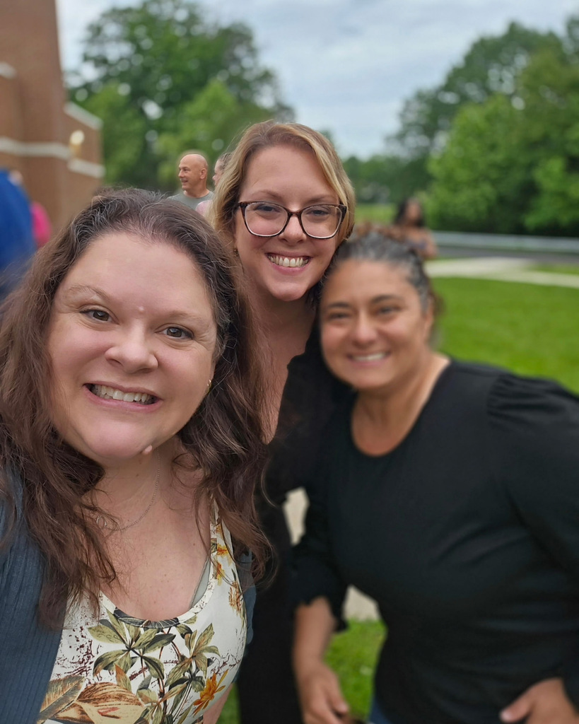 Three parents from the PCC take a selfie together.