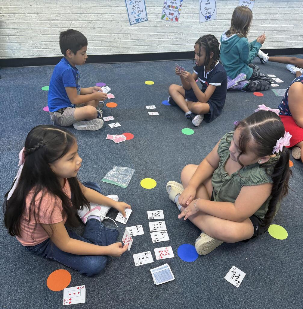 2nd graders play math games