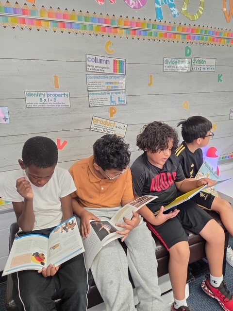 Students reading for Drop Everything and Read