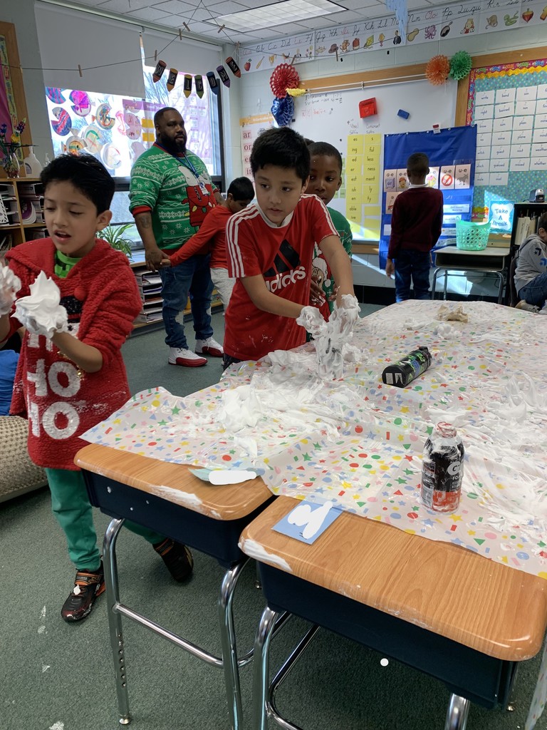 3rd Grade making "snow" with their Best Buddies!