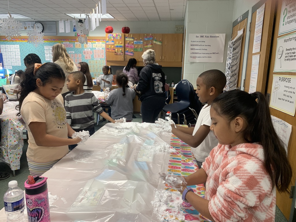 3rd Grade making "snow" with their Best Buddies!