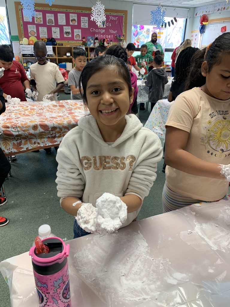 3rd Grade making "snow" with their Best Buddies!