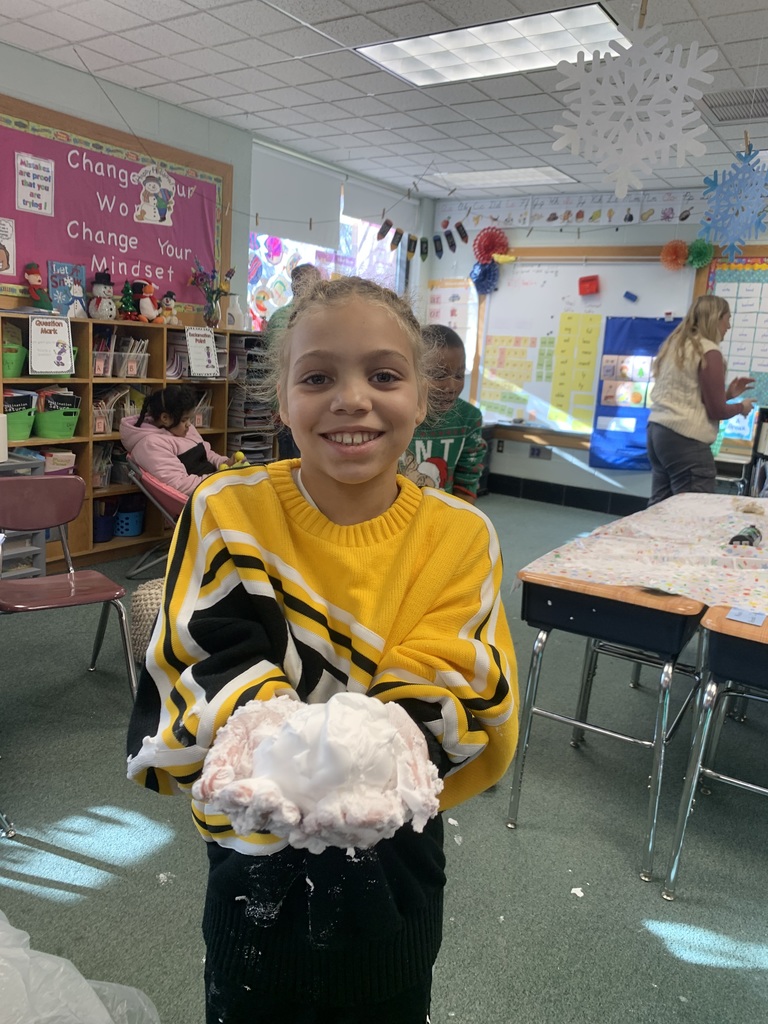 3rd Grade making "snow" with their Best Buddies!