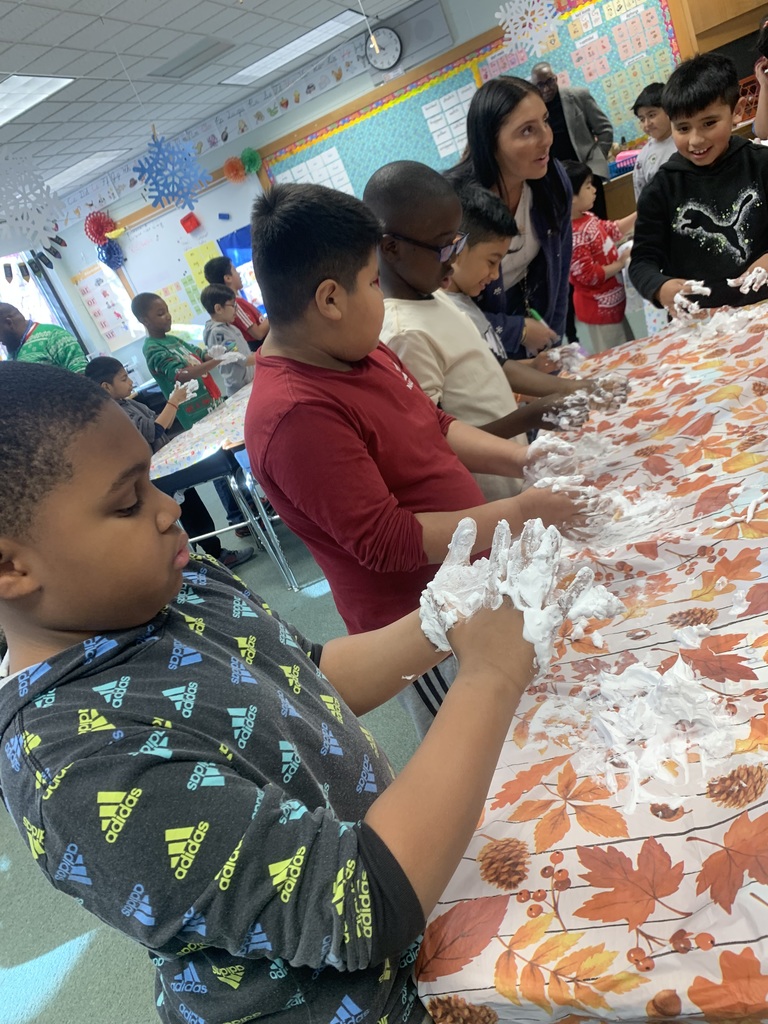 3rd Grade making "snow" with their Best Buddies!