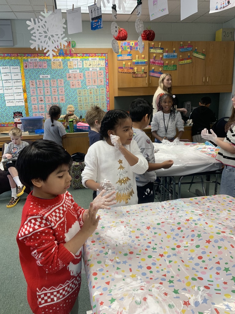 3rd Grade making "snow" with their Best Buddies!