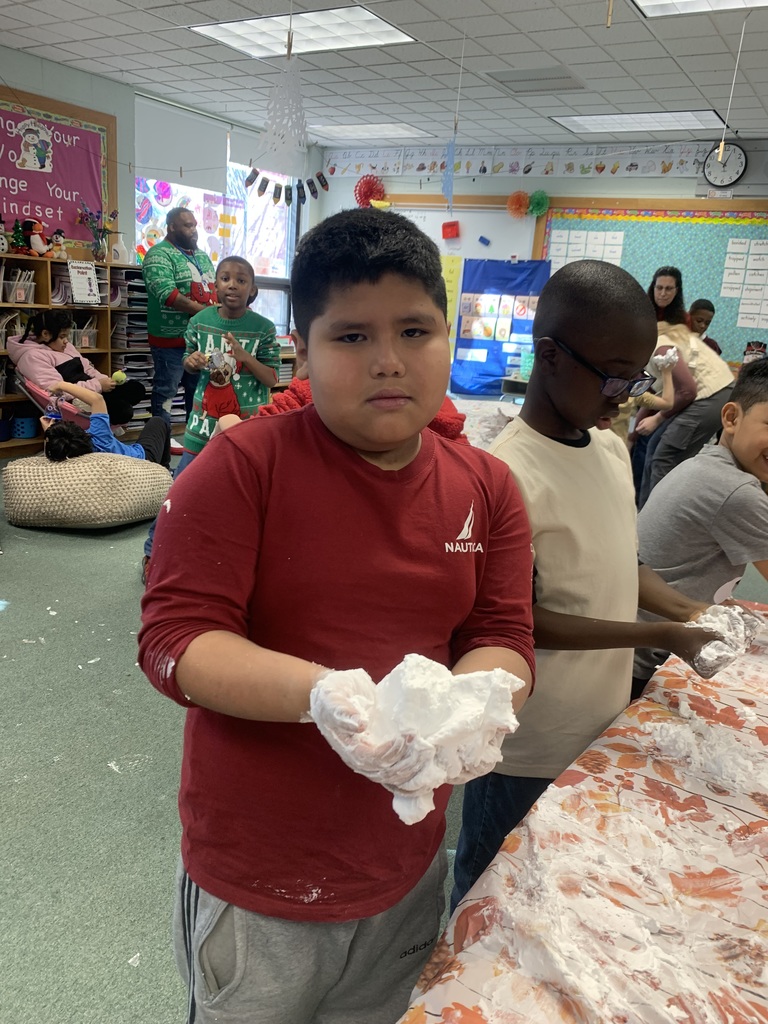 3rd Grade making "snow" with their Best Buddies!
