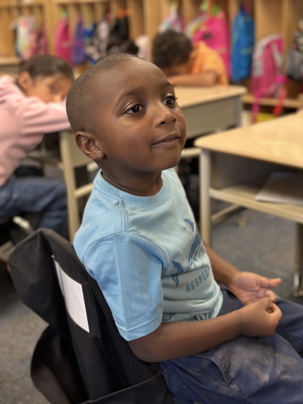 Kindergarten student learning in the classroom.
