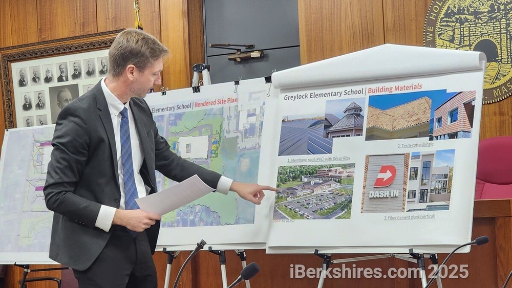 Jesse Saylor of TSKP Studios goes over the new Greylock School's exterior cladding at Monday's Planning Board meeting.