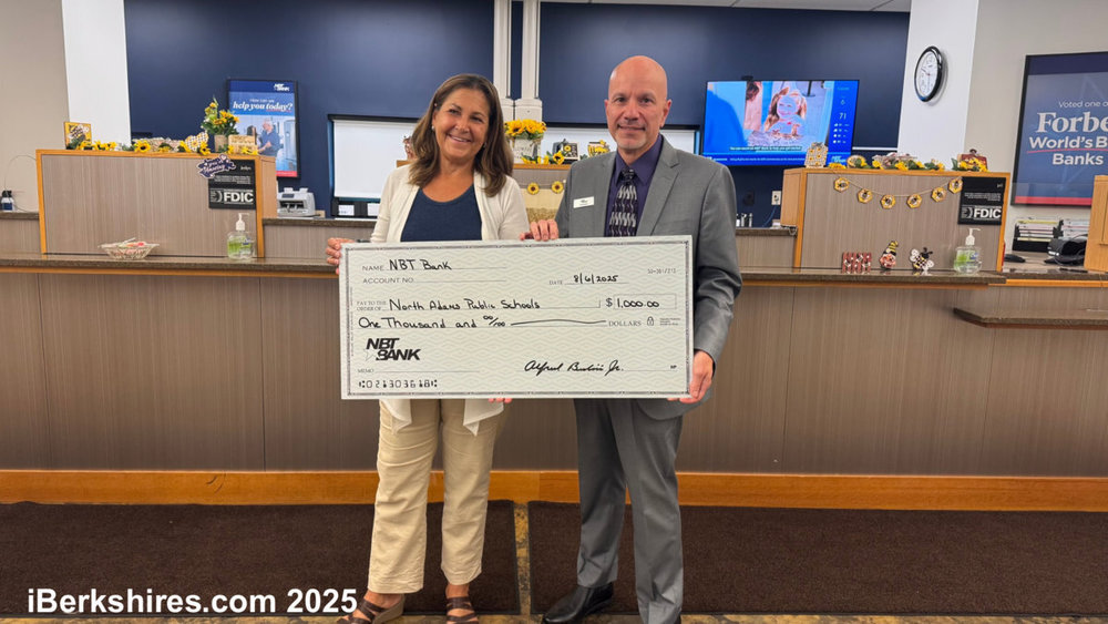 NAPS accepting a check from NBT Bankl