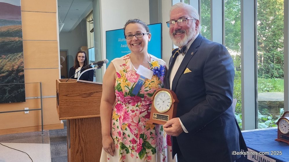 Dr. Pecor accepting Distinguished Alumni Award