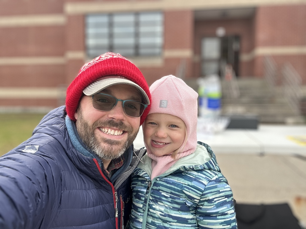 Parent and student outside Brayton Elementary School