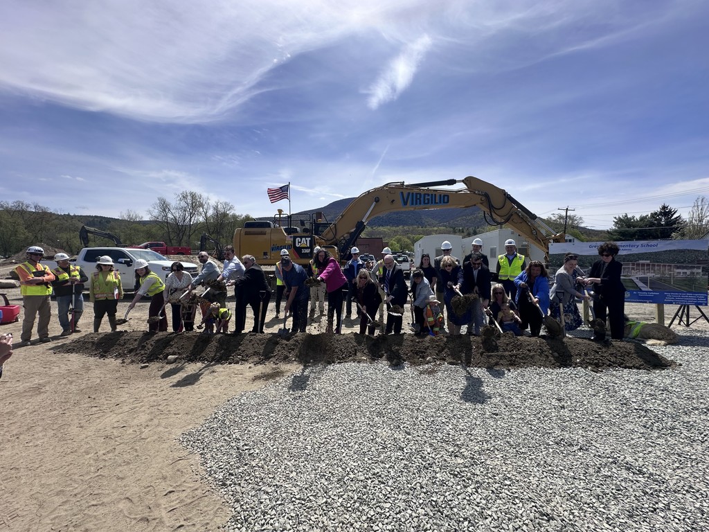 Groundbreaking committee in front of the site