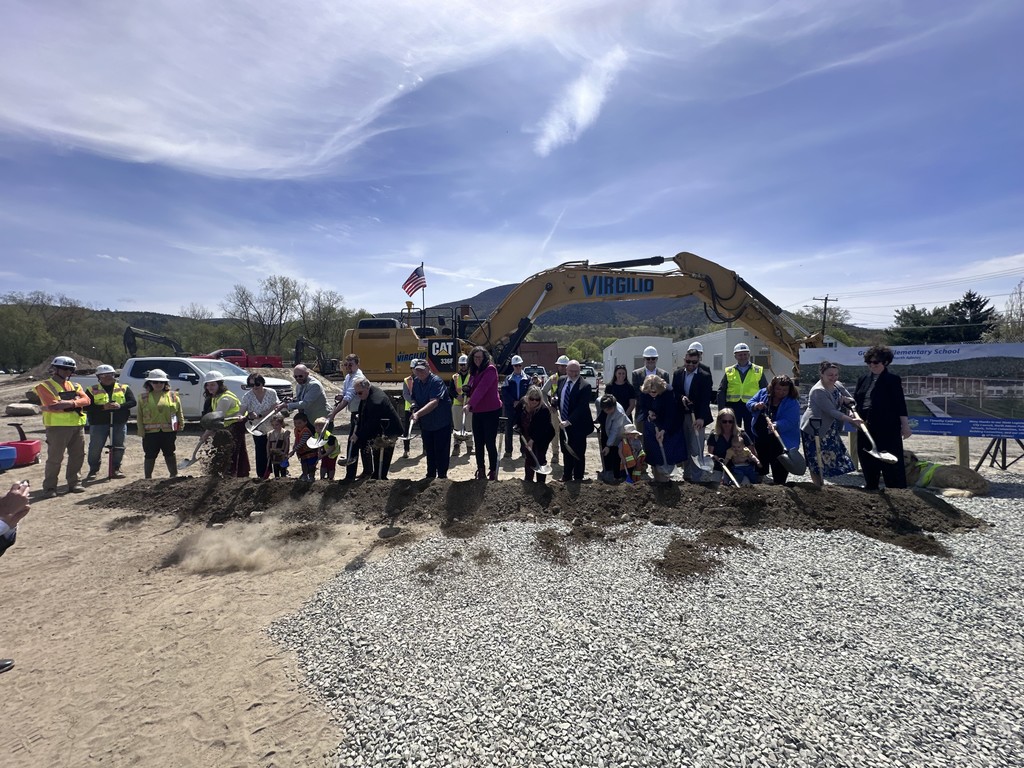 Groundbreaking committee in front of the site