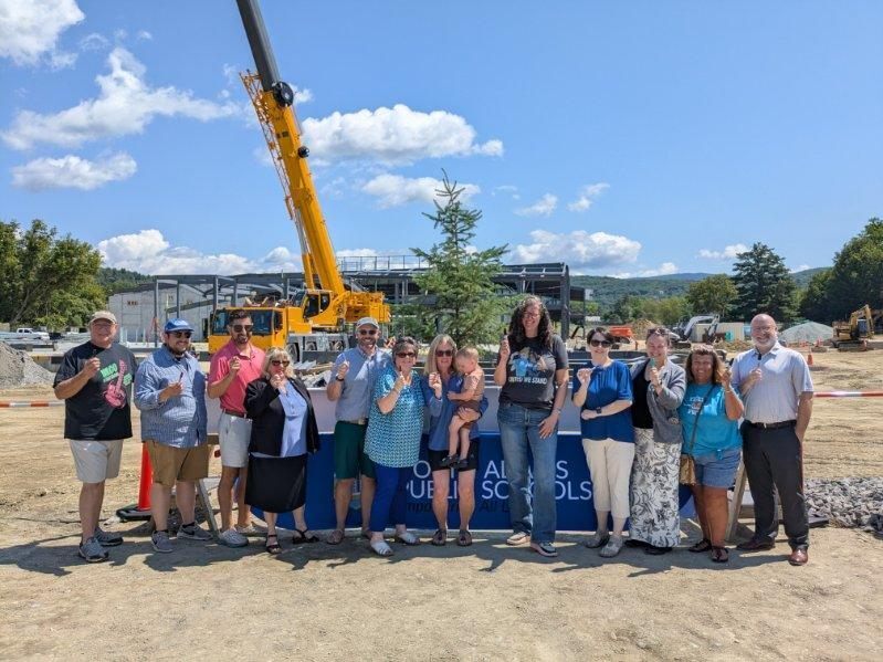 Steel signing  school building committee