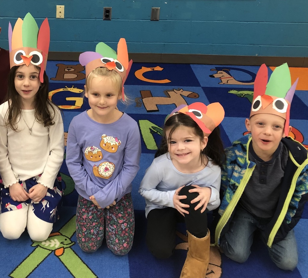 children wearing turkey hats