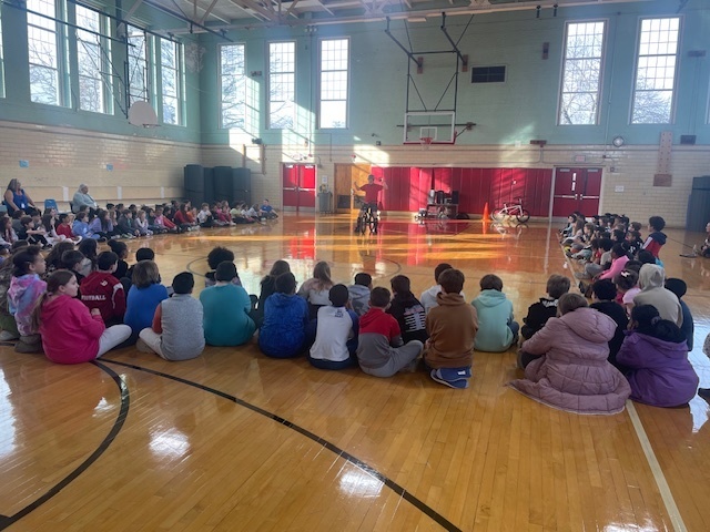 Chris Poulos talking to our students.