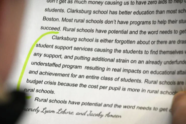 a close up of a letter written by a student