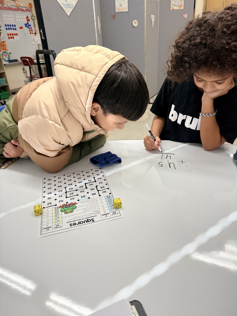 At Parsons, Mrs. Bauer's math students worked hard and played hard, using a capture the box game to practice solving 2-digit addition problems.