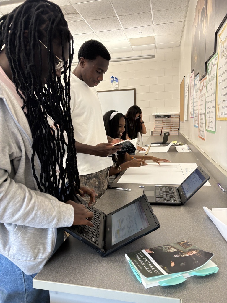 Students worked in groups to close read passages from "The Picture of Dorian Gray" and "Pride and Prejudice".