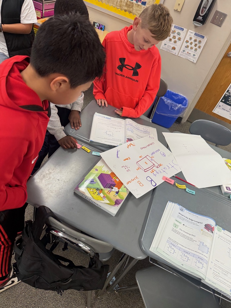 Students analyzing other students' strategies