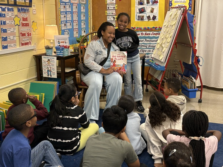 Mrs. Booker reads to our class. 