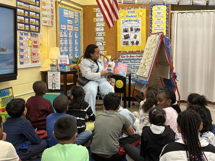 Mrs. Booker reads to our class. 