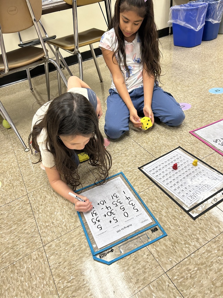 Students practicing addition games