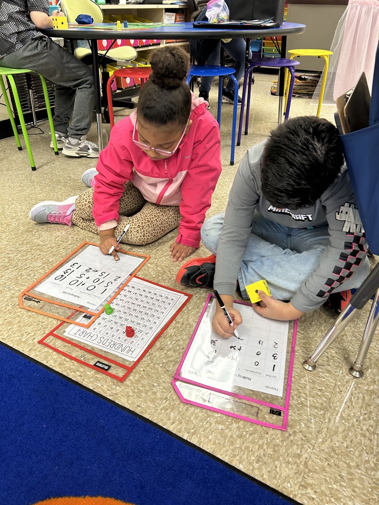Students practicing addition games