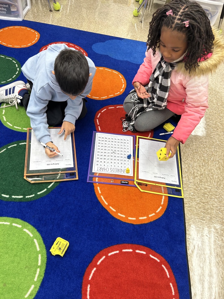 Students practicing addition games