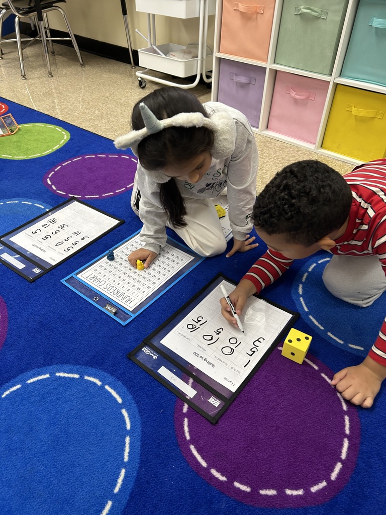 Students practicing addition games
