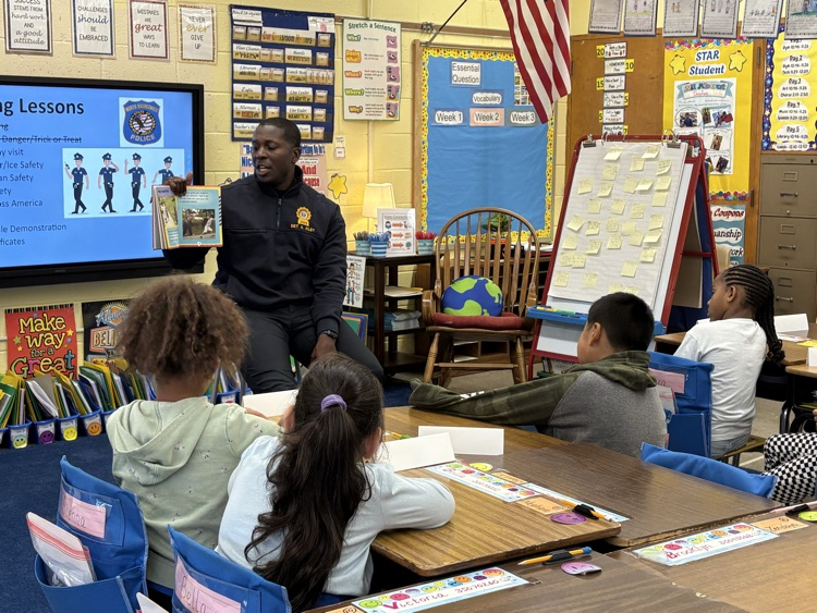 Detective Adrian talks to the kids about staying safe.