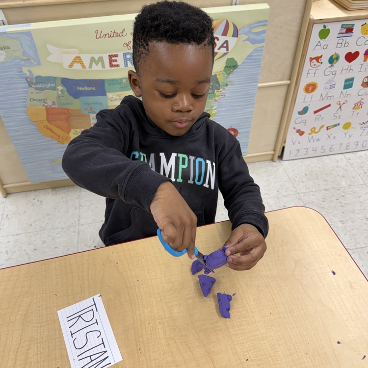 Playdough cutting and name tracing 