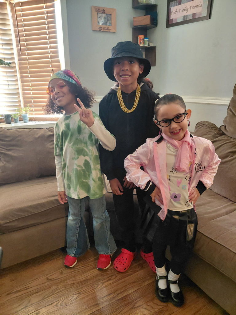 Students dressed up as different decades ranging from the 1950s to the 1990s.