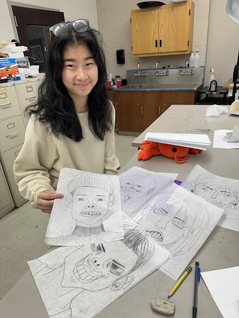 Annie Yin created a series of original cartoon characters as part of the Portraiture and Cartooning art class.