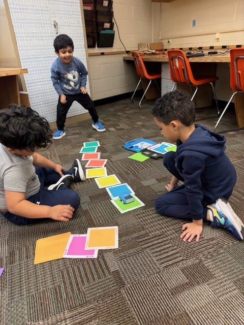 Students programming robotic cars