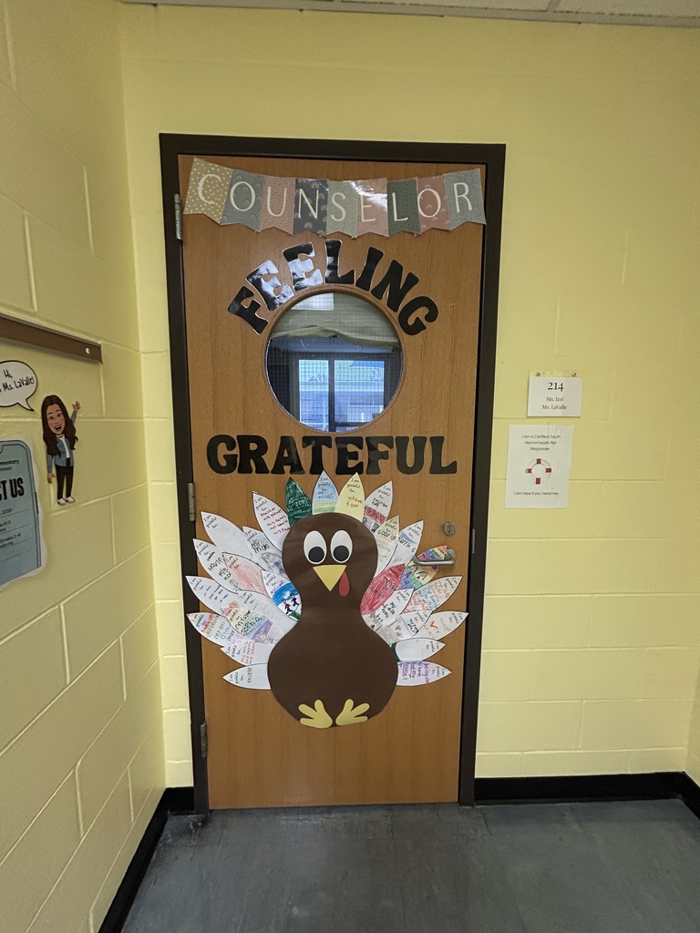 Displayed is a turkey. Students decorated their own feathers to show what they are thankful for. 