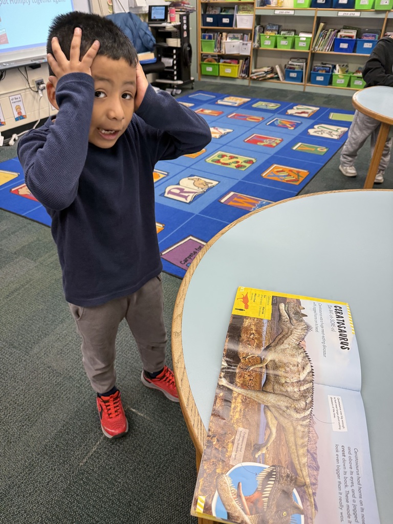 Student is surprised by the size of the dinosaur